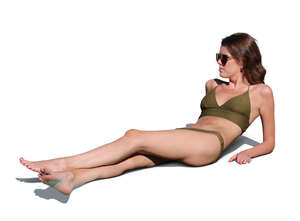 cut out woman sunbathing by the pool