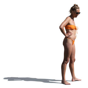 cut out woman in bikini standing at the beach