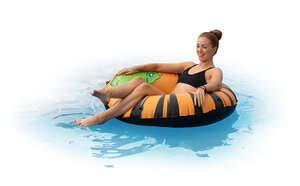 cut out woman floating in a big swim ring