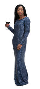 cut out woman in a blue evening gown standing and drinking wine 