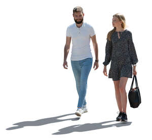 cut out backlit man and woman walking on the street