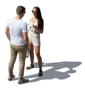 cut out man and woman standing and talking seen from above