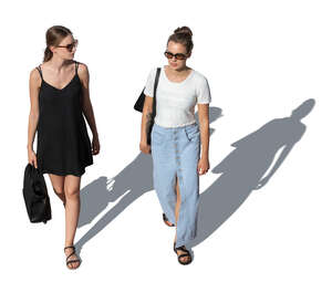 two cut out young women walking seen from above