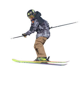 cut out boy skiing and doing jump tricks