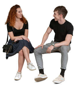 cut out man and woman sitting and talking happily