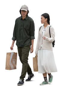 cut out asian man and woman with shopping bags walking and talking