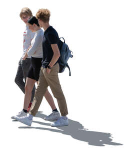 cut out backlit group of three teenagers walking