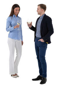cut out man and woman standing and drinking wine at a social event