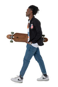 cut out young black man with a skateboard walking