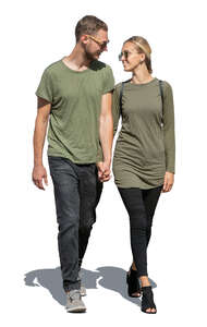 cut out couple in matching outfits walking