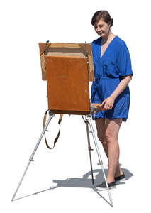 woman painting on an easel