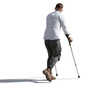 man walking with crutches