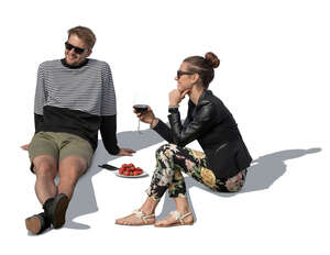 cut out man and woman sitting on a terrace and drinking wine