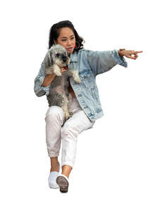 cut out woman with a dog sitting and pointing at smth