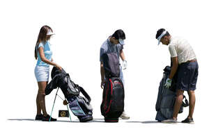 three cut out people preparing to play golf