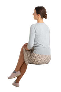 cut out woman sitting seen from back angle