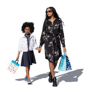 cut out mother and daughter with shopping bags walking hand in hand