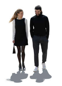 cut out backlit man and woman walking and talking