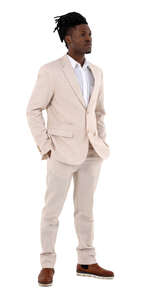 cut out man in a white suit standing hands in his pockets