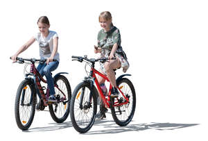 two cut out girls riding bikes side by side