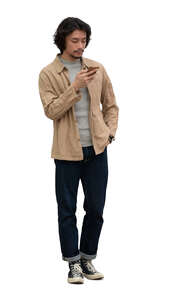cut out man standing and looking at his phone
