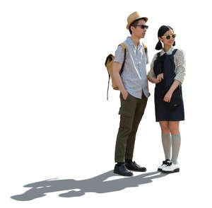 two cut out backlit young asian people standing