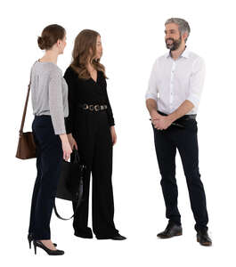 three cut out people standing and talking