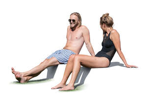 cut out man and woman sunbathing on a terrace