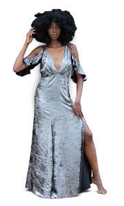 cut out woman in a long silver dress standing barefoot