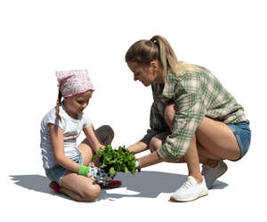 cut out mother and daughter planting in the garden
