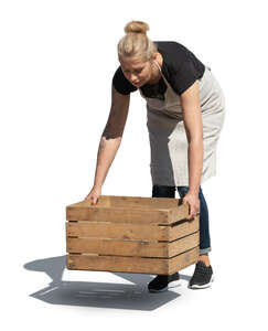 cut out woman lifting a wooden crate