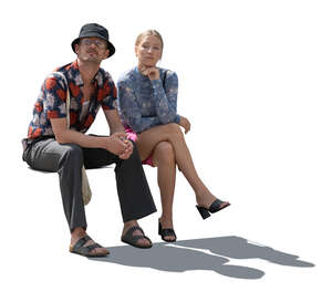 cut out backlit man and woman sitting