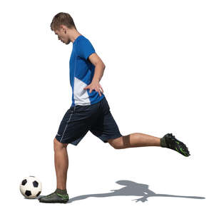 cut out football player kicking a ball