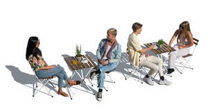 cut out top view of a street cafe with four people