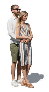 cut out man and woman standing together and looking into distance