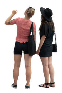 two cut out young women standing and looking up