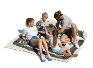 cut out top view of a family having a picnic