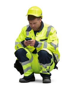 cut out worker on a break squatting and texting