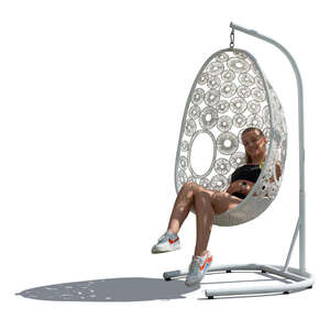cut out teenage girl sitting in a white hanging chair