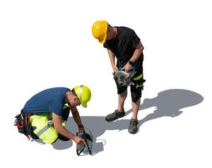 two cut out workmen working seen from above
