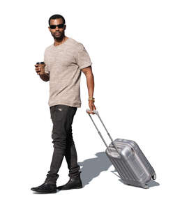 cut out man with a suitcase walking and drinking coffee