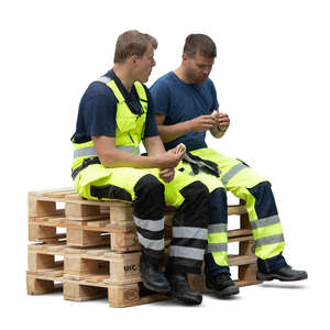 two cut out workmen eating lunch
