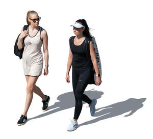 two cut out female tennis players walking seen from above