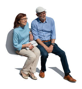 cut out senior couple sitting seen from above