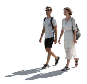 two cut out backlit people walking in summertime