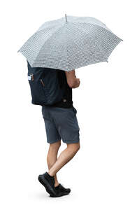 cut out man with a checkered umbrella walking in the summer rain