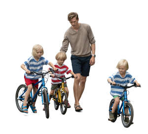 father with three sons who are riding bikes