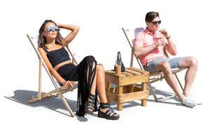 cut out man and woman relaxing on beach chairs and drinking cold drinks