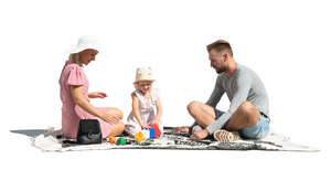 cut out family playing outside on the picnic blanket