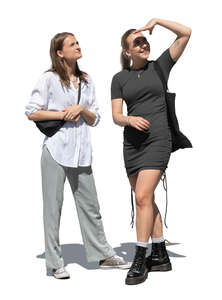 two cut out women standing and looking up